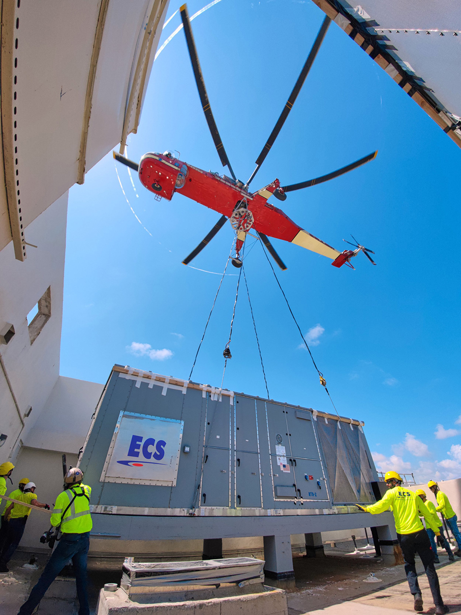 Crane lifting industrial HVAC