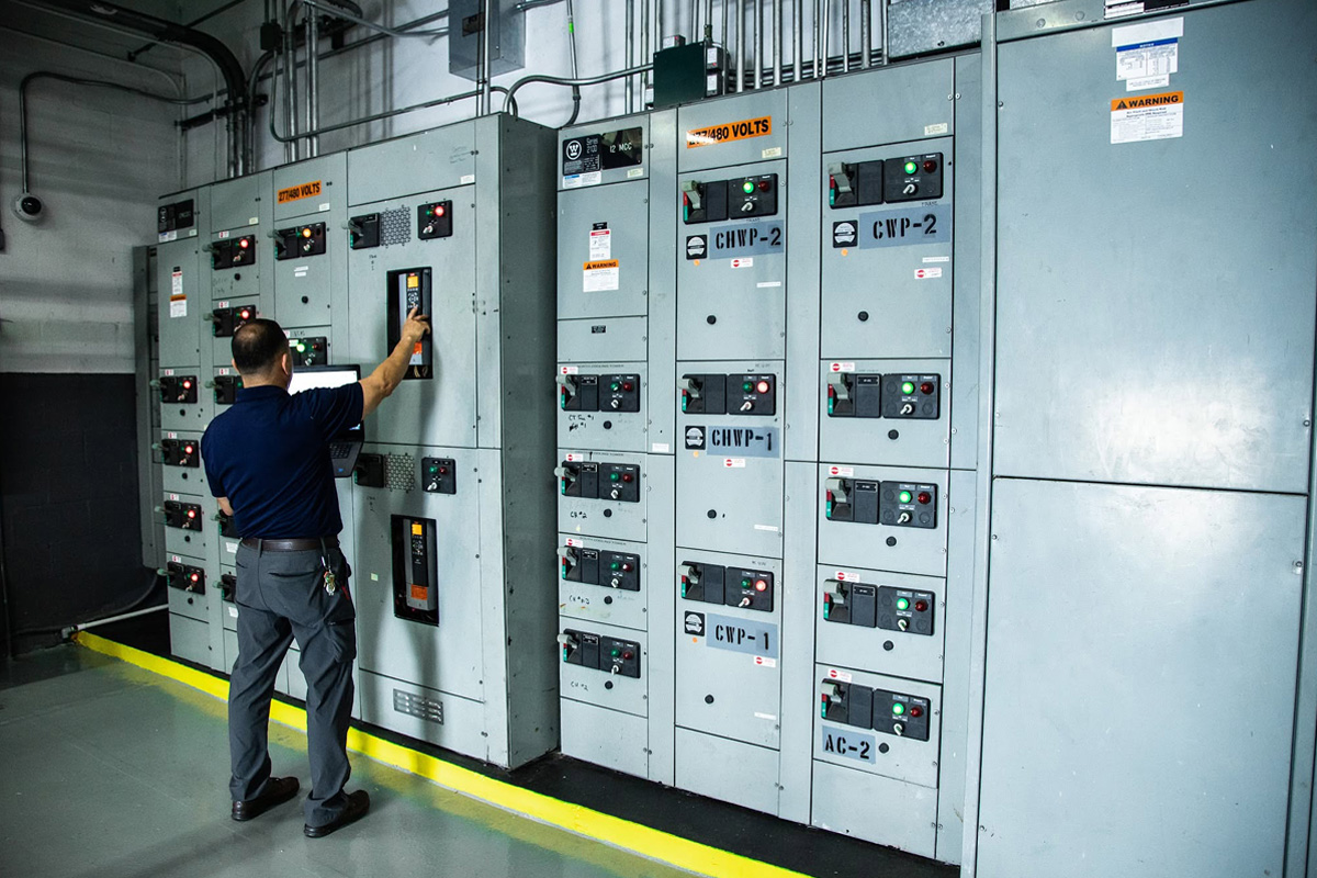 ecs techinician checking equipment